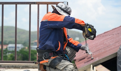 Johnson Restoration Workers on Roof