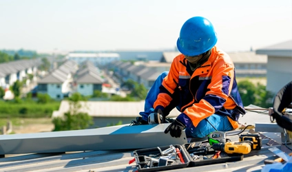 Johnson Restoration Worker Repairing Roof